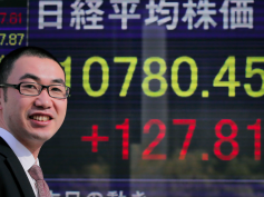 Nikkei rises as yen weakens